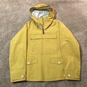 Men’s small Burberry rain jacket with hood. New with tags. Can be unisex!